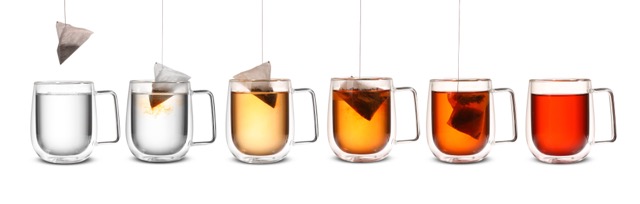 cups of tea at different stages of steeping